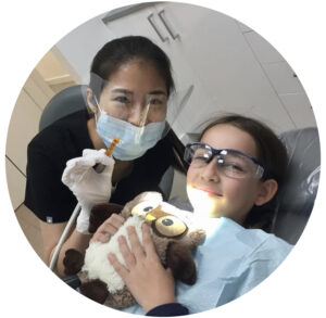 pediatric dentistry center Dr Kim with little girl